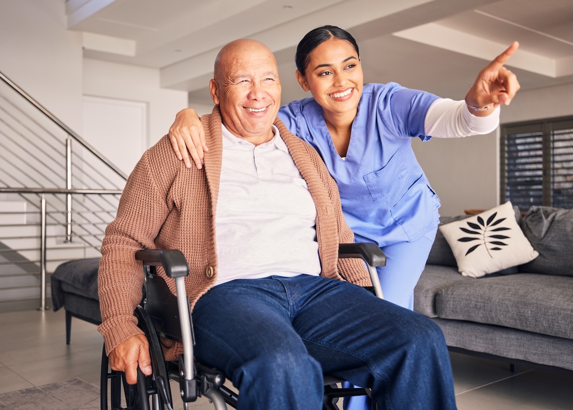 Old man, wheelchair or happy caregiver pointing or talking with healthcare support at nursing home
