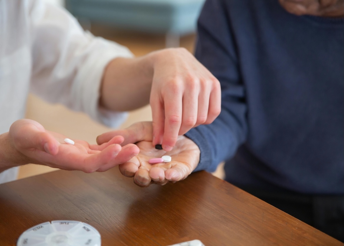 nurse giving patient medication